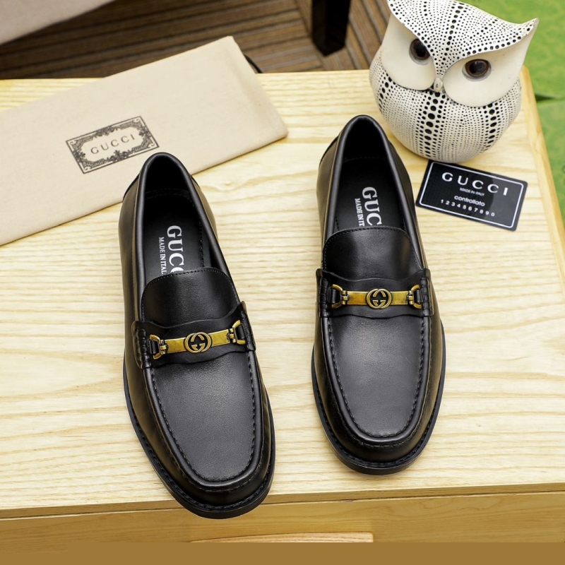 G*u*i leather shoes